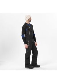 DREAMSCAPE - Spodnie snowboardowe ogrodniczki męskie Dreamscape SNB 900 UP. Kolor: beżowy, czarny, wielokolorowy. Materiał: materiał, puch. Sezon: zima. Sport: snowboard