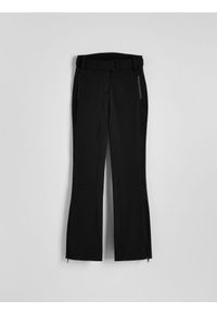 Reserved - Spodnie water-repellent z ociepleniem - czarny. Stan: podwyższony. Kolor: czarny. Materiał: tkanina #1