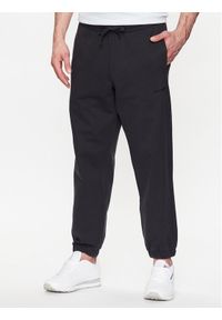 New Balance Spodnie dresowe MP23551 Czarny Relaxed Fit. Kolor: czarny. Materiał: bawełna, dresówka