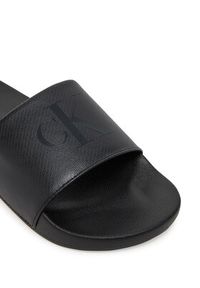 Calvin Klein Jeans Klapki Slide Aop Print YM0YM01269 Czarny. Kolor: czarny. Wzór: nadruk