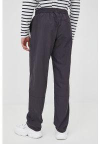 Rains spodnie 18700 Woven Pants Regular kolor czarny proste high waist. Stan: podwyższony. Kolor: czarny. Materiał: tkanina