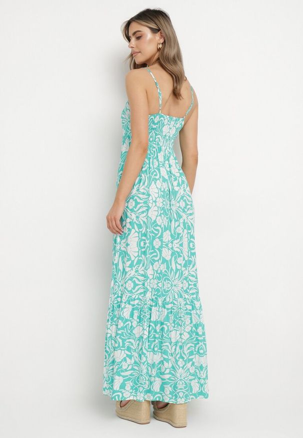 Born2be - Niebieska Sukienka Maxi z Bawełny na Cienkich Ramiączkach z Falbanką i Kwiatowym Printem Miora. Kolor: niebieski. Materiał: bawełna. Długość rękawa: na ramiączkach. Wzór: kwiaty, nadruk. Sezon: lato. Długość: maxi