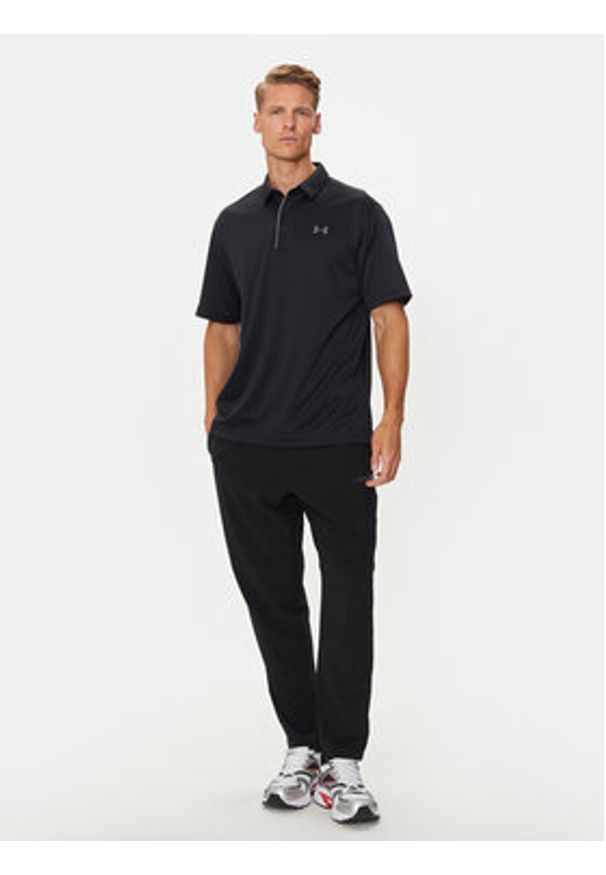 Under Armour Polo UA Tech 1290140 Czarny Loose Fit. Typ kołnierza: polo. Kolor: czarny. Materiał: syntetyk