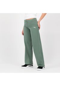 Spodnie dresowe damskie Puma Gym & Pilates. Kolor: zielony. Materiał: bawełna, poliester, elastan. Sport: joga i pilates #1