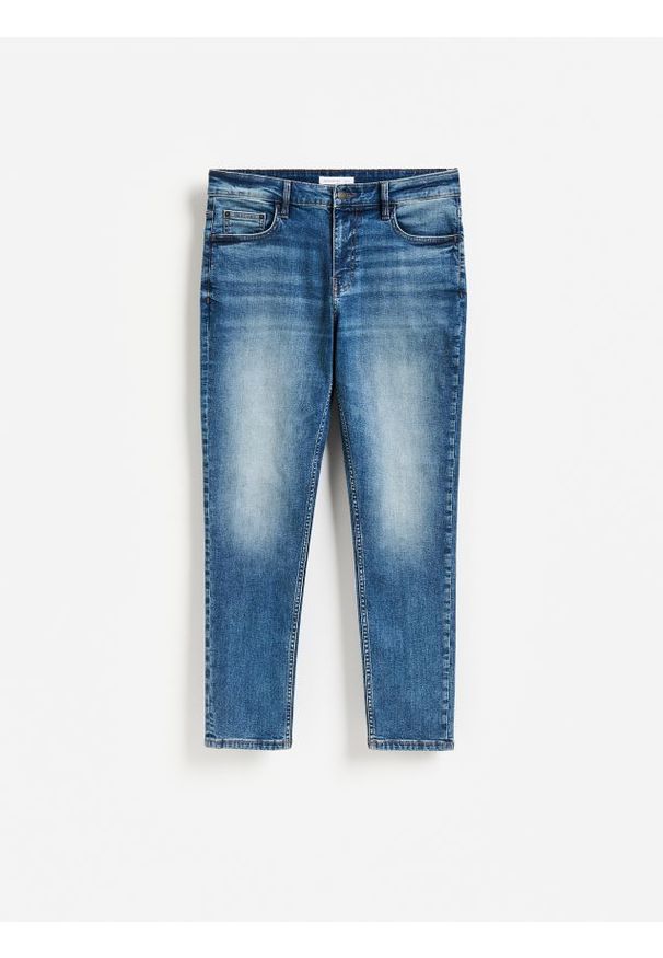 Reserved - Jeansy slim fit z efektem sprania - granatowy. Kolor: niebieski