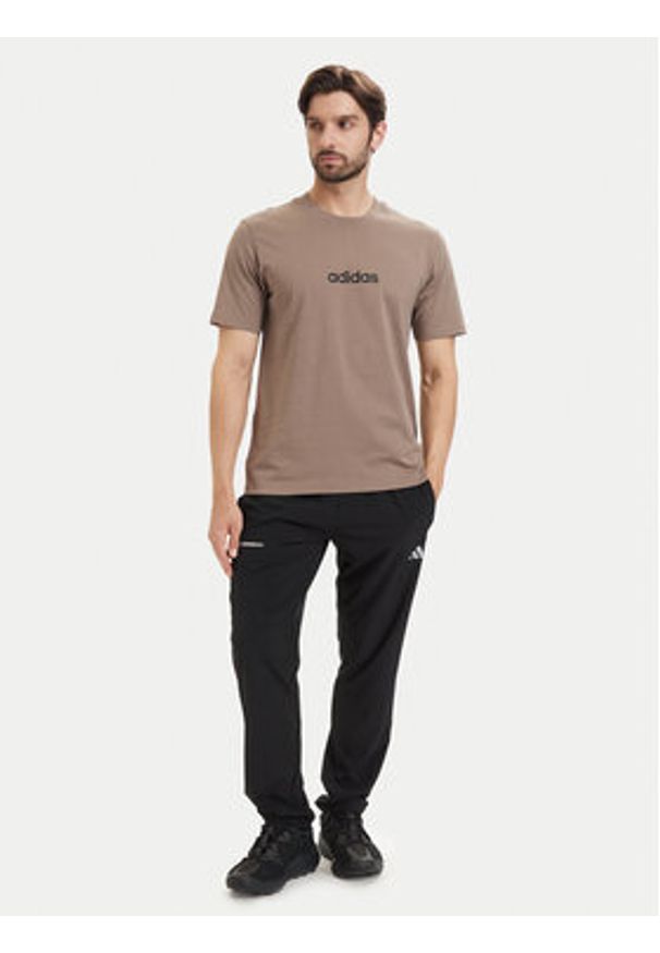 Adidas - adidas T-Shirt Essentials Linear KF2390 Beżowy Regular Fit. Kolor: beżowy. Materiał: bawełna