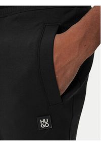 Hugo - HUGO Spodnie dresowe Dimacs 50533695 Czarny Relaxed Fit. Kolor: czarny. Materiał: bawełna #5