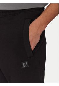 Hugo - HUGO Spodnie dresowe Dimacs 50533695 Czarny Regular Fit. Kolor: czarny. Materiał: bawełna
