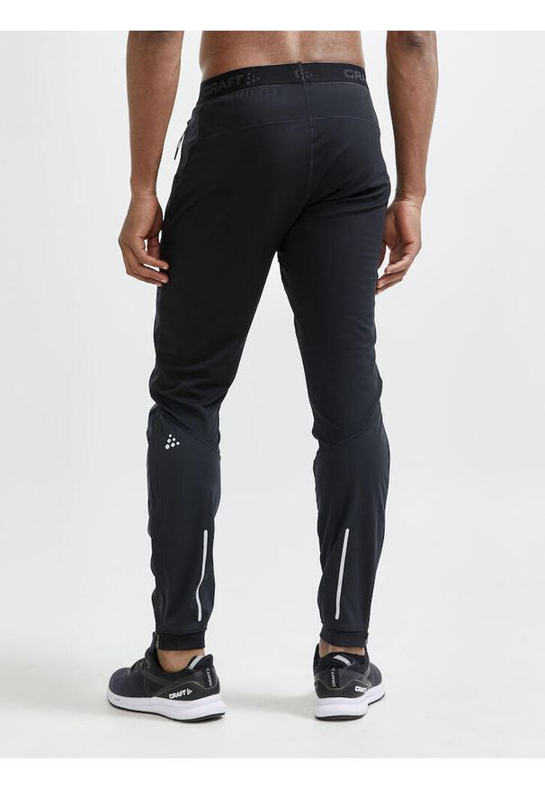 Spodnie sportowe męskie Craft Essence Wind. Kolor: czarny. Materiał: dresówka. Sport: fitness