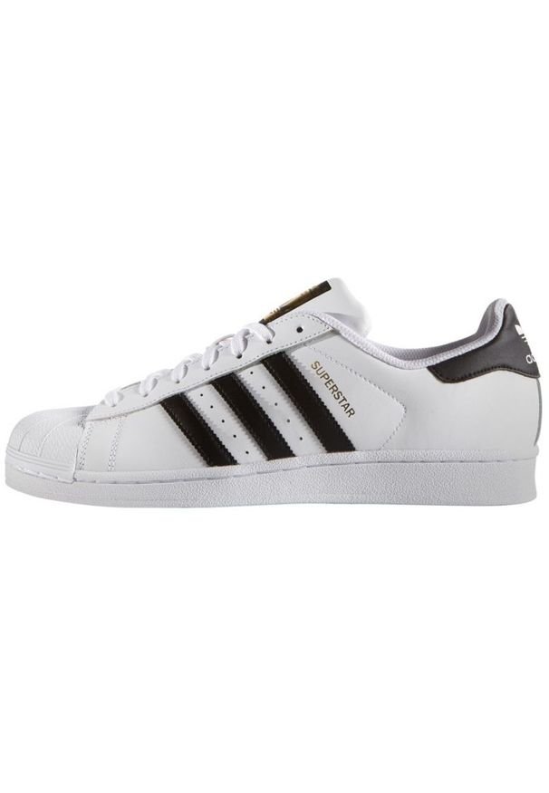 Adidas - Buty adidas Originals Superstar M C77124 białe. Zapięcie: pasek. Kolor: biały. Materiał: guma, materiał, skóra. Szerokość cholewki: normalna. Wzór: aplikacja, jodełka. Sezon: lato. Model: Adidas Superstar. Sport: koszykówka