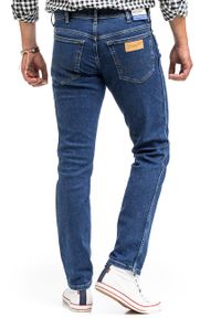 Wrangler - WRANGLER TEXAS SLIM MĘSKIE SPODNIE JEANSOWE CRAZY GAME W12SOAR26. Okazja: na spotkanie biznesowe. Styl: elegancki, biznesowy