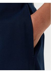 TOMMY HILFIGER - Tommy Hilfiger Spodnie materiałowe WW0WW46749 Granatowy Relaxed Fit. Kolor: niebieski. Materiał: wiskoza