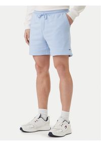 Tommy Jeans Szorty sportowe DM0DM21931 Niebieski Regular Fit. Kolor: niebieski. Materiał: bawełna. Styl: sportowy #1