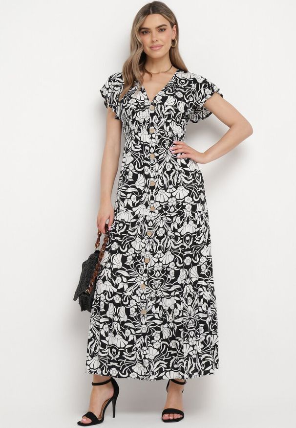 Born2be - Czarna Rozkloszowana Sukienka Maxi z Luźnym Rękawem w Kwiatowy Print Oxeria. Kolor: czarny. Wzór: kwiaty, nadruk. Sezon: lato. Typ sukienki: rozkloszowane. Długość: maxi