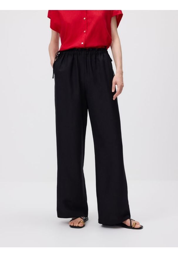 Reserved - Spodnie z lnem - czarny. Kolor: czarny. Materiał: len