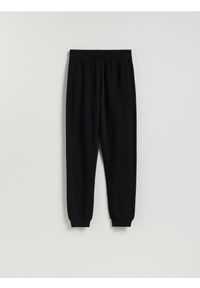 Reserved - Spodnie dresowe long leg - czarny. Kolor: czarny. Materiał: dresówka