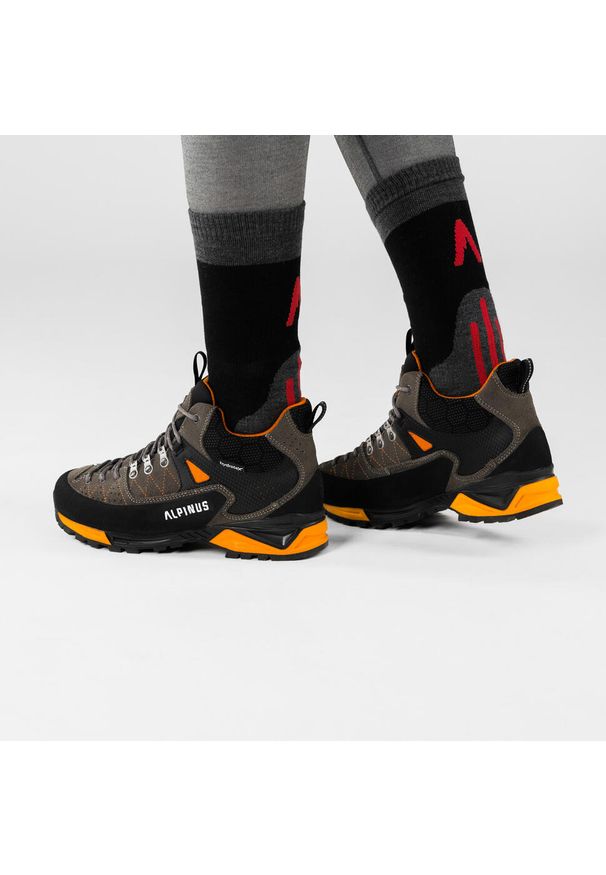 Buty trekkingowe dla dorosłych Alpinus The Ridge Mid Pro. Kolor: szary, pomarańczowy, wielokolorowy. Styl: sportowy. Sport: turystyka piesza