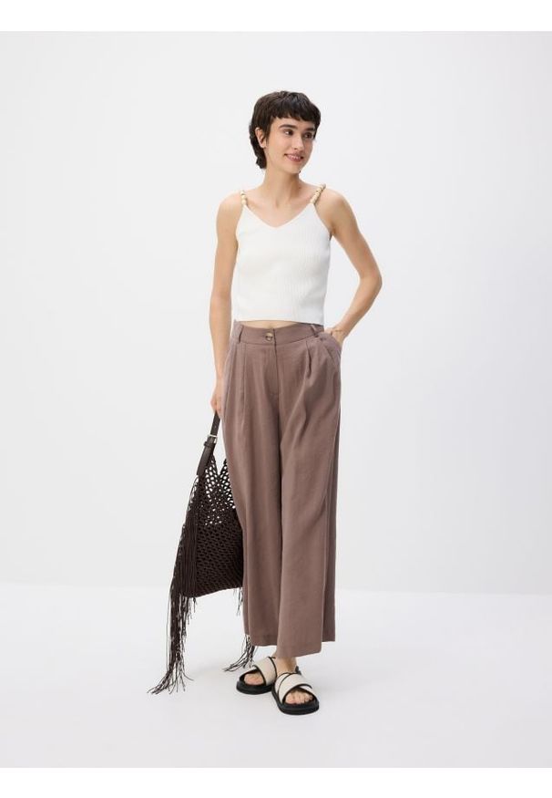 Reserved - Szerokie spodnie z modalu - beżowy. Kolor: beżowy