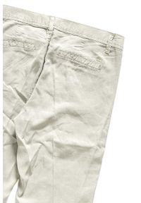 Wrangler - SPODNIE WRANGLER DAMSKIE CHINO FADED KHAKI W27LPG028. Kolor: brązowy. Materiał: len. Długość: do kostek. Sezon: lato. Styl: elegancki