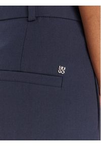 Hugo - HUGO Spodnie materiałowe Harenau 50542606 Granatowy Relaxed Fit. Kolor: niebieski. Materiał: lyocell, bawełna