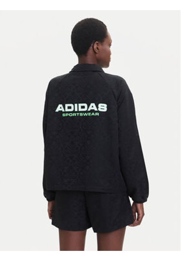 Adidas - adidas Kurtka przejściowa Tiro x Common Goal Coaches JL7647 Czarny Loose Fit. Kolor: czarny. Materiał: syntetyk