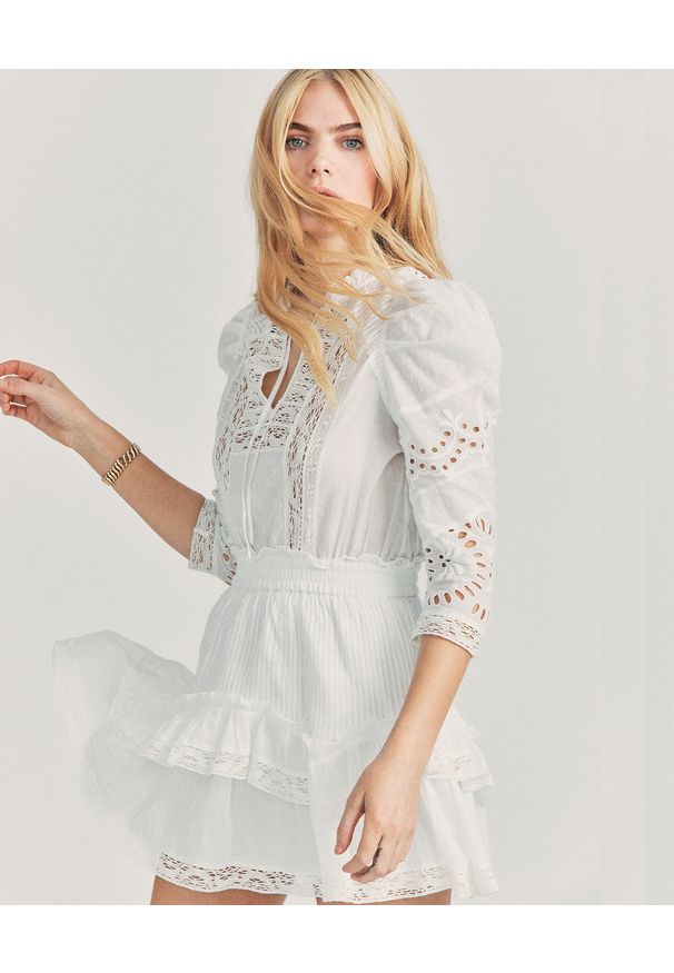 LOVE SHACK FANCY - Bawełniana mini sukienka Isidore. Kolor: biały. Materiał: bawełna. Typ sukienki: rozkloszowane. Długość: mini
