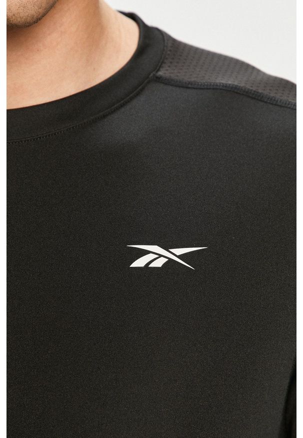 Reebok - T-shirt. Okazja: na co dzień. Kolor: czarny. Materiał: dzianina, skóra. Wzór: gładki. Styl: casual