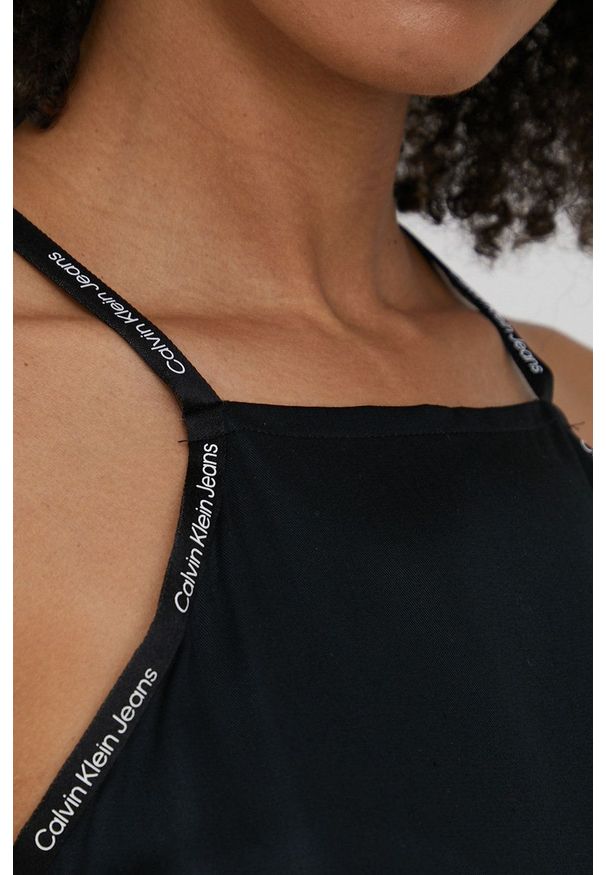 Calvin Klein Jeans sukienka kolor czarny mini rozkloszowana. Kolor: czarny. Materiał: tkanina. Długość rękawa: na ramiączkach. Wzór: gładki. Typ sukienki: rozkloszowane. Długość: mini