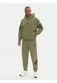 Adidas - adidas Spodnie dresowe Future Icons 3-Stripes JD4891 Zielony Loose Fit. Kolor: zielony. Materiał: bawełna, syntetyk #4