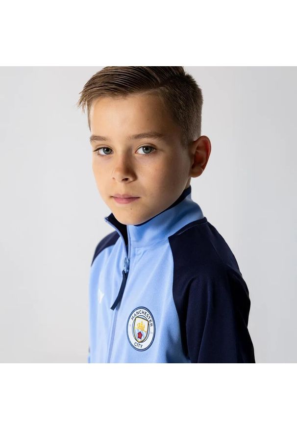 MANCHESTER CITY - Dres piłkarski dziecięcy Manchester City 24/25. Kolor: niebieski. Materiał: dresówka. Styl: sportowy