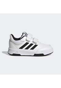 Adidas - Buty sportowe dla dzieci ADIDAS Tensaur. Okazja: na uczelnię. Zapięcie: rzepy. Kolor: biały, wielokolorowy, czarny. Materiał: materiał. Szerokość cholewki: normalna. Wzór: paski