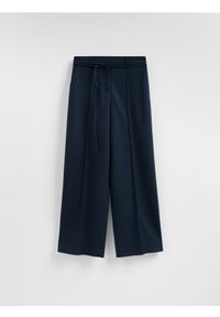 Reserved - Spodnie z kantem - granatowy. Kolor: niebieski. Materiał: wiskoza, tkanina