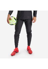 KIPSTA - Spodnie do piłki nożnej Kipsta Viralto Solo. Kolor: wielokolorowy, szary, czarny, różowy, czerwony. Materiał: materiał, poliester, elastan. Sport: piłka nożna #1