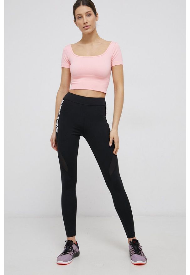 Guess - Legginsy. Kolor: czarny. Materiał: skóra, dzianina. Wzór: nadruk