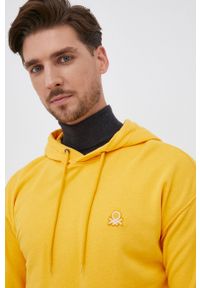 United Colors of Benetton Bluza bawełniana męska kolor żółty z kapturem gładka. Okazja: na co dzień. Typ kołnierza: kaptur. Kolor: żółty. Materiał: bawełna. Wzór: gładki. Styl: casual #3