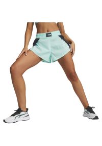 Spodenki Puma Fit Fashion Woven Flow Short, Kobiety. Kolor: niebieski. Materiał: materiał, poliester