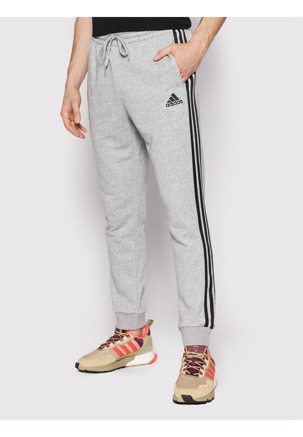 Adidas - Spodnie dresowe adidas. Kolor: szary. Materiał: dresówka
