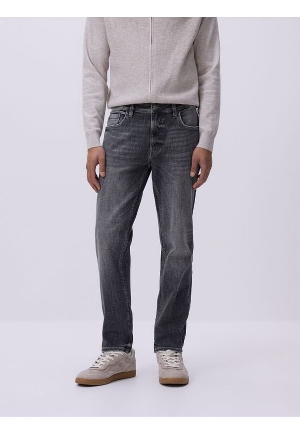 Reserved - Jeansy slim z efektem sprania - szary. Kolor: szary
