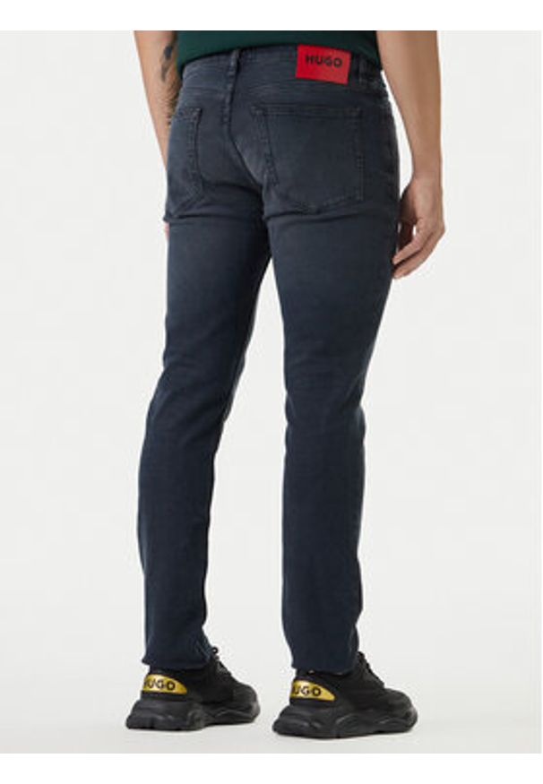 Hugo - HUGO Jeansy 50556055 Granatowy Extra Slim Fit. Kolor: niebieski