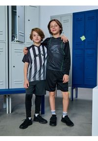 Sinsay - Sportowe szorty z legginsami Active - czarny. Kolor: czarny. Styl: sportowy