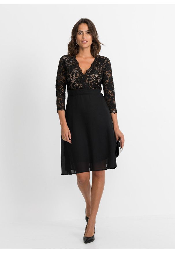 bonprix - Sukienka szyfonowa z koronką. Typ kołnierza: dekolt w serek. Kolor: czarny. Materiał: szyfon, koronka. Wzór: koronka. Styl: elegancki