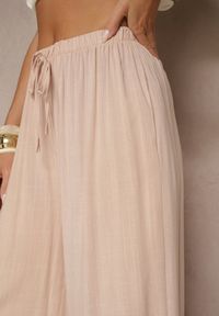 Renee - Jasnoróżowe Szerokie Spodnie High Waist z Gumką w Talii Ilnena. Okazja: na co dzień, na spotkanie biznesowe, na spacer. Stan: podwyższony. Kolor: różowy. Materiał: materiał, wiskoza. Sezon: lato. Styl: biznesowy, elegancki, casual