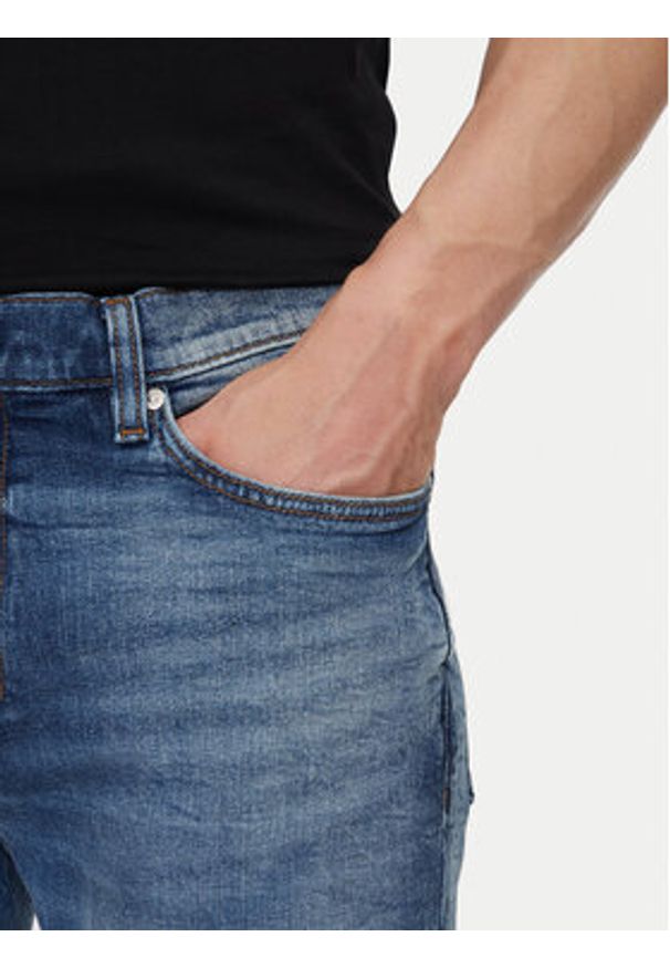 Hugo - HUGO Jeansy 50537698 Niebieski Slim Fit. Kolor: niebieski