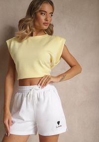 Renee - Białe Klasyczne Szorty Dresowe z Kieszeniami Wiązane w Pasie Folenelle. Okazja: na co dzień, na imprezę. Kolor: biały. Materiał: dresówka. Sezon: lato. Styl: klasyczny