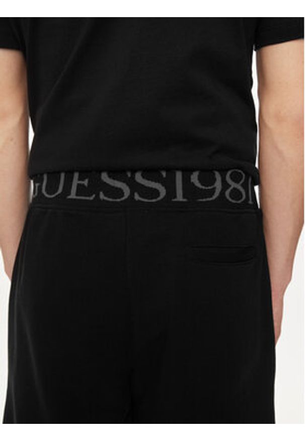 Guess Szorty materiałowe Clovis M4GD10 KBK32 Czarny Loose Fit. Kolor: czarny. Materiał: syntetyk, bawełna