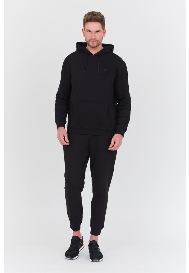Guess - GUESS Czarne męskie spodnie dresowe Aldwin, Rozmiar XL. Kolor: czarny. Materiał: dresówka