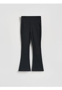 Reserved - Legginsy flare - czarny. Kolor: czarny. Materiał: bawełna, dzianina #1