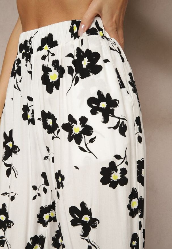Renee - Białe Szerokie Spodnie High Waist w Kwiatowy Wzór Elsedia. Okazja: na co dzień. Stan: podwyższony. Kolor: biały. Wzór: kwiaty. Styl: elegancki, casual