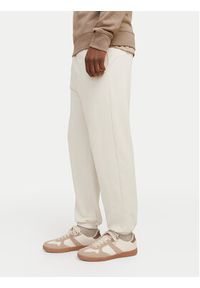 Jack & Jones Spodnie dresowe Morgan 12257964 Beżowy Regular Fit. Kolor: beżowy. Materiał: bawełna