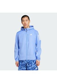 Adidas - Kurtka Own the Run. Kolor: niebieski. Materiał: materiał. Sport: bieganie #1